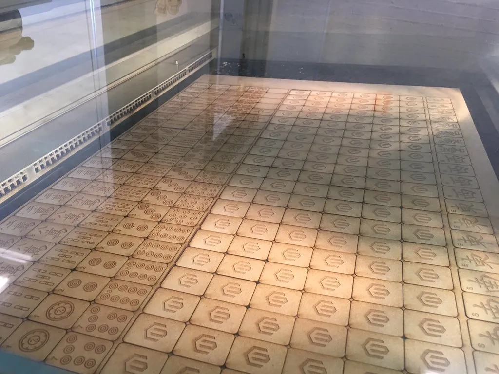 Laser cutting the tiles from a 6mm MDF sheet